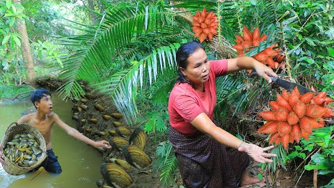 Survival skills-Man with woman found mussels for cook and salak -Eating delicious